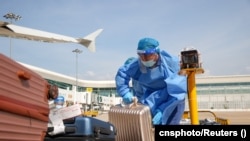 Çində aeroport işçisi, iyul, 2022-ci il