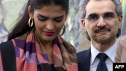 Şahzadə Al Waleed bin Talal və xanımı Amira al-Taweel.