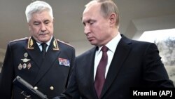 Владимир Колоколтсев бо Владимир Путин, акс аз соли 2019