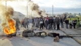 Kazakhstan - To defend against police forces Shanyraq residents built barricades from stones and old tires, Shanyraq's events, 14Jul2006