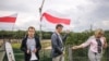 Belarus - Representatives of the center-right coalition hold a picket in memory of the journalist Paval Sharamet near the Belarusian TV company building. Minsk, 20Jul2016