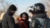 Kazakhstan - Police officers check people. Zhanaozen, 18Dec2011