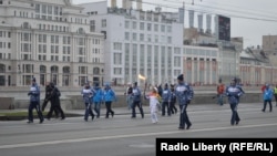 Олимпийский факел на улицах Москвы