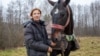 Belarus - Alena takes care of the horses, which are blackballed from the big sport and circus arena, Jakubiancy village, 8Nov2019