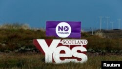 U.K. -- Placards showing 'Yes" and "No" are displayed on moorland on the Isle of Lewis, in the Outer Hebrides of Scotland, September 14, 2014