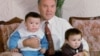 KAZAKHSTAN -- Kazakh President Nursultan Nazarbayev with his grandchildren - Aysultan (Left) and Altay. 1992